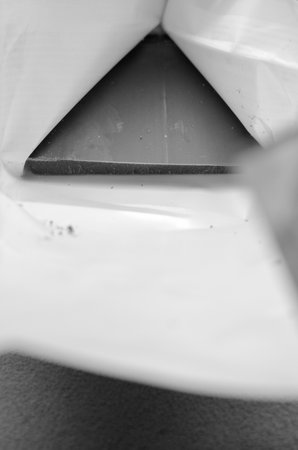 Abstract shape from the rest of the contents in the semi-open original packagingの写真素材