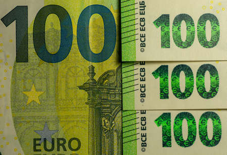 Detail of a 100 euros banknote. Money. Finance. Close up. Selective focus.の写真素材