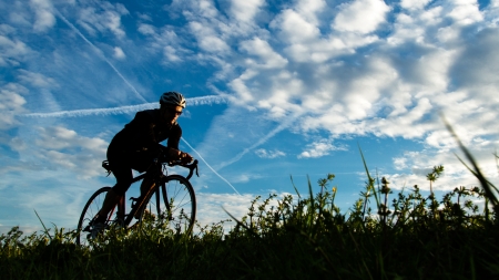 cyclist in a sundownの写真素材