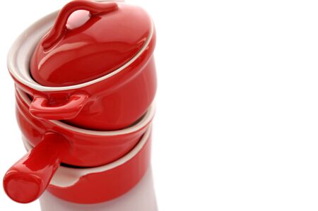 3 ceramic, red pans on a white backgroundの写真素材