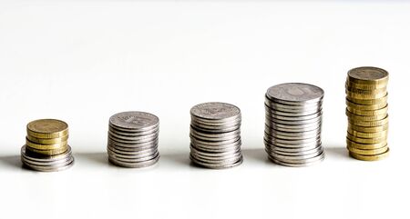a line of coins in stack