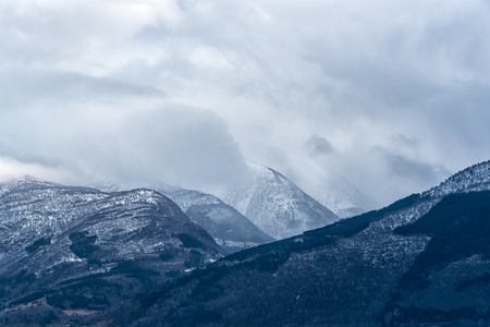 Mountain range covered in cloudsの写真素材