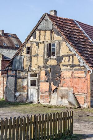 old decayed timbered houseの写真素材