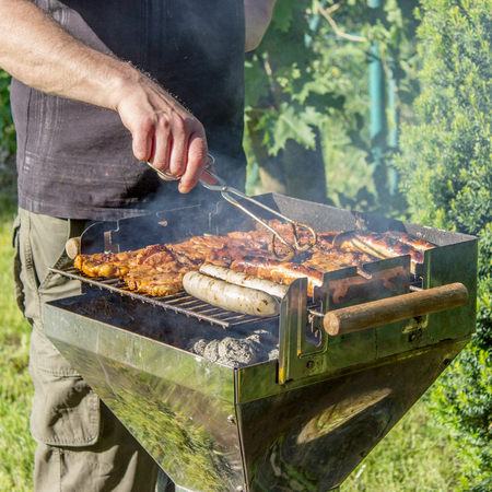 Grilling at sunsetの写真素材