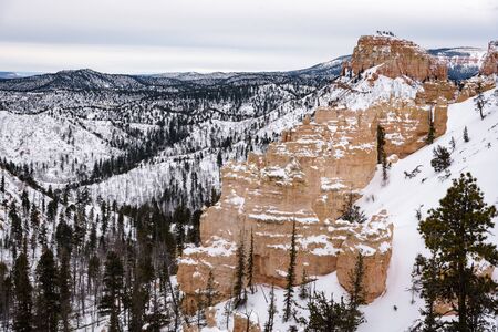 Beautiful snow covered mountains during the freezing winter period in Bryce  Canyon National Park,...