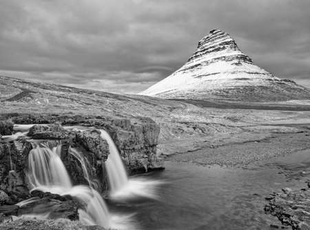 Kirkjufell with Kirkjufellsfoss in springの写真素材