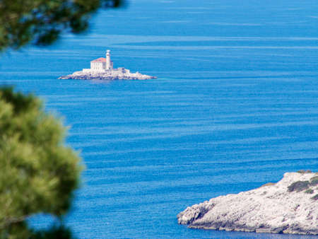 lighthouse in the seaの写真素材