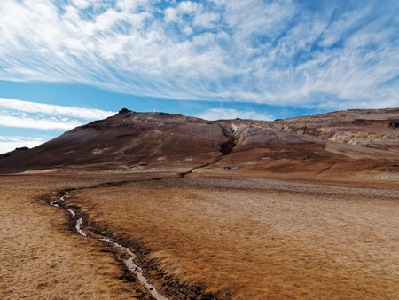 Scenic view of volcanic landscape against skyの写真素材