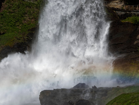 Rainbow in a waterfall in Norwayの写真素材