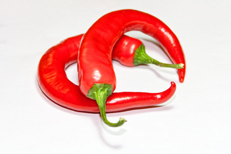Red hot chili peppers on a white background. Close up.の写真素材