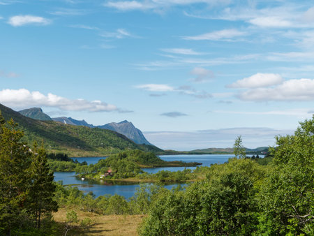 Norwegian fjord landscape with mountains, fjord and villageの写真素材