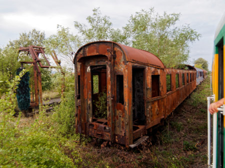 Old rusty train wagons on a railway station in the countryside.の写真素材