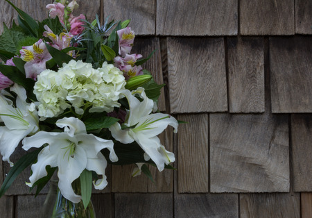 Bouquet with Casablanca lilies at a wedding in the countryside of France on Valentines Dayの写真素材