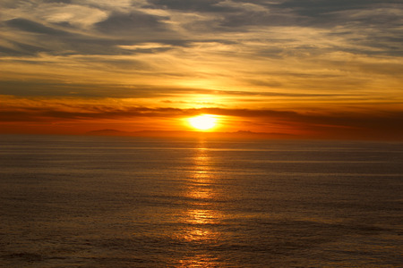 Sunset over the ocean in Laguna Beach Southern Californiaの写真素材