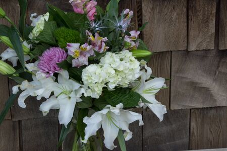 Bouquet with Casablanca lilies at a wedding in the countryside of France on Valentines Dayの写真素材