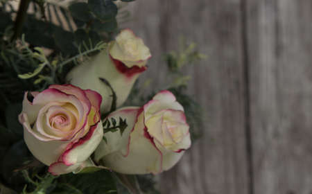 A bouquet of osira roses at a wedding in the countryside of France on Valentines Dayの写真素材
