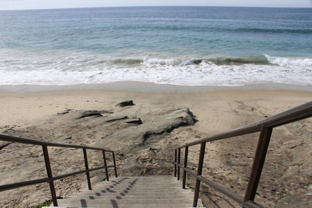 Stairs and view of the Pacific Ocean at Heisler Park in Laguna Beach Californiaの写真素材