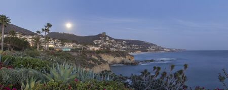 Moonrise over Laguna Beach along the coastline of Southern Californiaの写真素材