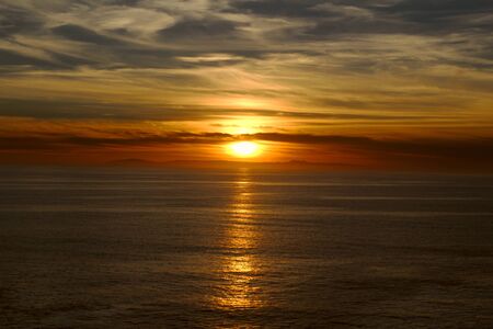 Sunset over the ocean in Laguna Beach Southern Californiaの写真素材