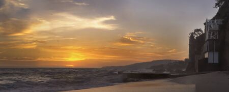 The sunset over the turret tower at Victoria Beach in Laguna Beach, Southern Californiaの写真素材