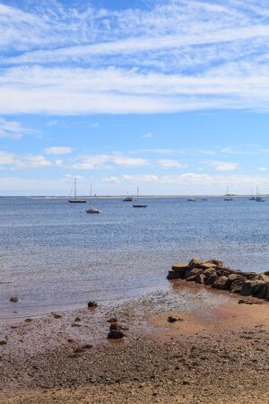 Provincetown, Massachusetts, Cape Cod  beach and ocean view with jetty.の写真素材