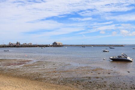 Provincetown, Massachusetts, Cape Cod beach with boatsの写真素材