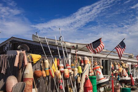 Buoys on a Cape Cod fishing shack in Massachusetts in summerのeditorial素材