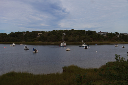 Orleans, Massachusetts  September 23, 2015: boats anchored in a quaint Cape Cod marsh.のeditorial素材