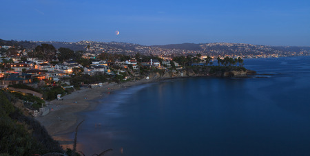 September 27, 2015. Laguna Beach, California Crescent Bay view of the blood moon. This full moon, also called a super moon and a harvest moon, is the result of a lunar eclipse.のeditorial素材