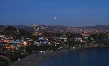 September 27, 2015. Laguna Beach, California Crescent Bay view of the blood moon. This full moon, also called a super moon and a harvest moon, is the result of a lunar eclipse.のeditorial素材