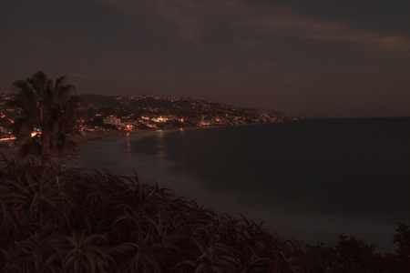 City lights view Laguna Beach at night, from Heisler Park in Laguna Beach, California.の写真素材