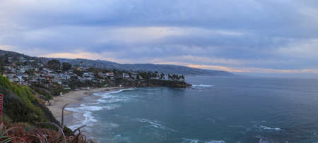 Moody sunrise over Crescent Bay in Laguna Beach, California in fallの写真素材