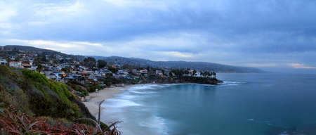 Moody sunrise over Crescent Bay in Laguna Beach, California in fallの写真素材