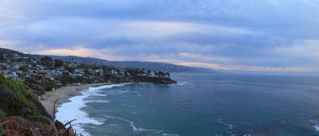 Moody sunrise over Crescent Bay in Laguna Beach, California in fallの写真素材