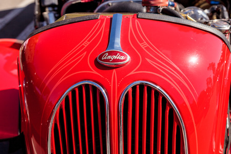 Laguna Beach, CA, USA - October 2, 2016: Red 1950 Ford Anglia Coupe owned by Robert Turek and displayed at the Rotary Club of Laguna Beach 2016 Classic Car Show. Editorial use.のeditorial素材