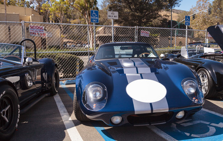 Laguna Beach, CA, USA - October 2, 2016: Black and white 1965 Ford Daytona coupe replica owned by David Ross and displayed at the Rotary Club of Laguna Beach 2016 Classic Car Show. Editorial use.のeditorial素材
