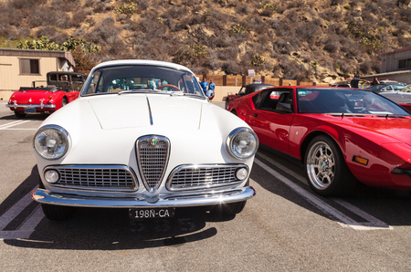 Laguna Beach, CA, USA - October 2, 2016: White 1959 Alfa Romeo Givlietta Sprint owned by Ahmet Tuncay and displayed at the Rotary Club of Laguna Beach 2016 Classic Car Show. Editorial use.のeditorial素材