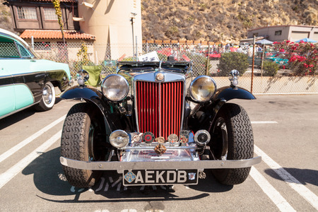Laguna Beach, CA, USA - October 2, 2016: Black and Red 1947 MG TC classic car owned by Tom Harkenrider and displayed at the Rotary Club of Laguna Beach 2016 Classic Car Show. Editorial use.のeditorial素材