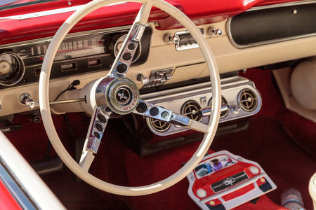 Laguna Beach, CA, USA - October 2, 2016: Red 1965 Ford Mustang owned by Beverly Morgan and displayed...