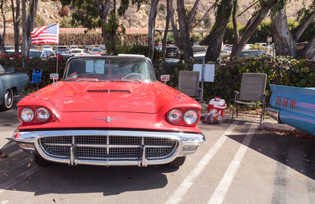 Laguna Beach, CA, USA - October 2, 2016: Red 1963 Ford Thunderbird displayed at the Rotary Club of Laguna Beach 2016 Classic Car Show. Editorial use.のeditorial素材