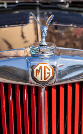 Laguna Beach, CA, USA - October 2, 2016: Black and Red 1947 MG TC classic car owned by Tom Harkenrider and displayed at the Rotary Club of Laguna Beach 2016 Classic Car Show. Editorial use.のeditorial素材