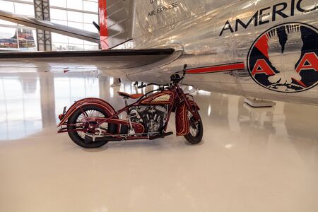 Santa Ana, CA, USA - January 21, 2017: Red Indian motorcycle displayed at the Lyon Air Museum in Santa Ana, California, United States. It was used during World War II. Editorial use only.のeditorial素材