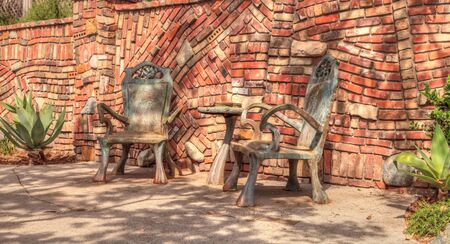 Laguna Beach, California, April 22, 2017: Bronze chairs at Browns Park in Laguna Beach, California. Editorial use only.のeditorial素材