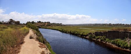 Upper Newport Bay Nature Preserve hiking trail winds along the marsh, where you will see wildlife in Newport Beach, California USAの写真素材
