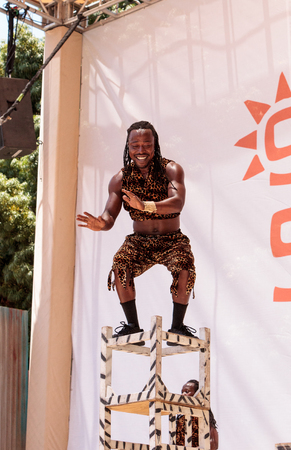 San Diego, CA, USA â July 1, 2017: Acrobatic performance of the Zuzu African acrobats at the San Diego Zoo Safari park. Editorial only.のeditorial素材