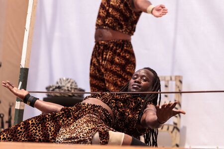 San Diego, CA, USA â July 1, 2017: Acrobatic performance of the Zuzu African acrobats at the San Diego Zoo Safari park. Editorial only.のeditorial素材