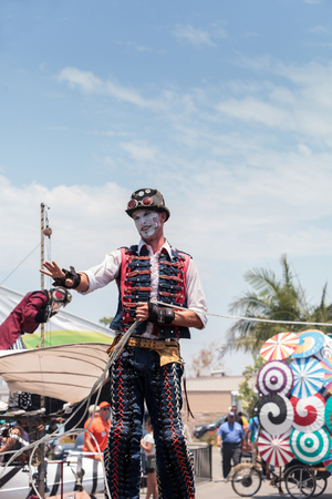 Costa Mesa, CA, USA - July 14, 2017: Performer Benjamin Gadbois with the Dragon Knights steampunk stilt walkers at the Orange County Fair in Costa Mesa, CA on July 16, 2016. Editorial use only.のeditorial素材