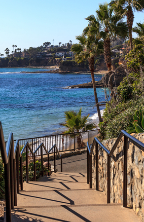 Steps leading down to Heisler Park above the ocean in Laguna Beach, California in fall.の写真素材