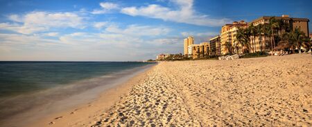 White sand and palm trees along Vanderbilt Beach in Naples, Florida, USAのeditorial素材