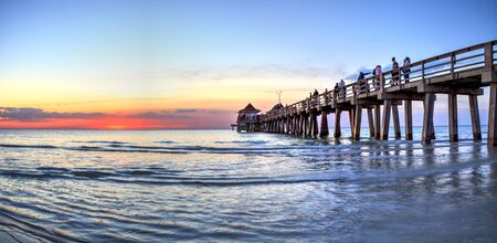 Naples Pier on the beach at sunset in Naples, Florida, USAのeditorial素材
